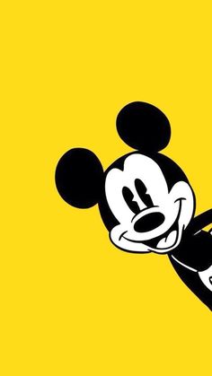 a mickey mouse cartoon character on a yellow background