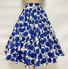 1950s style Full Circle Skirt Details: * Quality Cotton with spandex * Two side pockets * Standard Knee Length  from waist to Hem  28 inch approx Sizes -------Waist (inch） 00        --     24           0          ---    25            2           --     26              4           --    27          6          --     28            8          --     29          10         --    30           12        --     31.5 14          ---   33 16          ---   35.5 18          ---   38 20        ---   40.5 2 Retro Blue Flared Skirt Bottoms, Retro Blue Pleated Skirt, Retro Fitted Skirt Bottoms, Retro Flared Skirt With Pockets, Retro Fitted Skirt, Blue Retro A-line Skirt, Retro Blue A-line Skirt, Retro Blue Lined Skirt, High Waist Retro Pleated Skirt