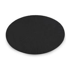 a round black plate on a white background