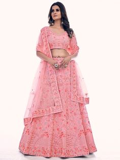 Buy radiant pink net embroidered lehenga choli for celebrating upcoming festival celebration. Shop this classy lehenga choli which comes with Net blouse and Net dupatta.