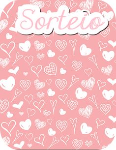 a jar filled with lots of hearts on top of a pink tablecloth covered in writing