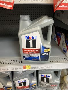 a bottle of mobil 1 high mileage sits on the shelf in a store