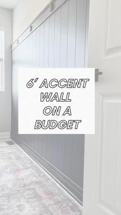 there is a white sign that says 8 accent wall on a budgett door