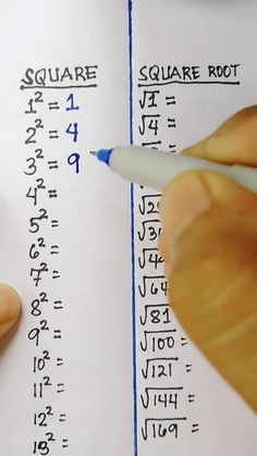 someone is writing numbers on a piece of paper