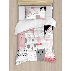 an image of a bed with cats and kittens printed on the comforter cover