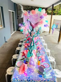 the table is set up for a mermaid party