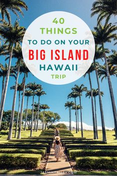 a woman walking down a path surrounded by palm trees with the words 40 things to do on your big island hawaii trip