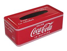 a coca - cola can with the lid open