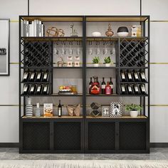 an open bookcase with many bottles and glasses on it in front of a wall