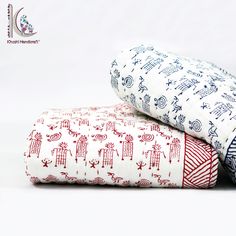 two sheets are stacked on top of each other in different colors and patterns, one is blue and the other is red