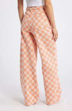 Made from sturdy cotton twill covered in a checkerboard print, these playful pants are designed with a high waist and baggy legs that pool at the hems. Exclusive retailer 32" inseam; 26" leg opening; 15" front rise; 18" back rise (size 14) Zip fly with button closure Five-pocket style 100% cotton Machine wash, line dry Imported How To Style Orange Pants, High Waist Baggy Pants, Vibrant Clothes, Preppy Jeans, Colorful Jeans, Colorful Pants, Funky Pants, Colourful Style, Colorful Clothes