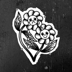 a black and white sticker with flowers on it