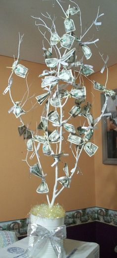 a tree made out of money sitting on top of a table