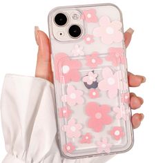 a person holding up a phone case with minnie mouse on the front and pink flowers on the back