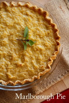 a pie sitting on top of a wooden table