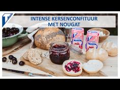 an image of bread, jam and other foods on a cutting board with the words intense kerseenconfiur met nougat