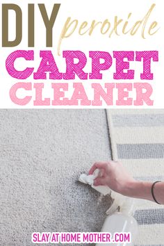 a woman is cleaning the carpet with a spray bottle and rag on top of it