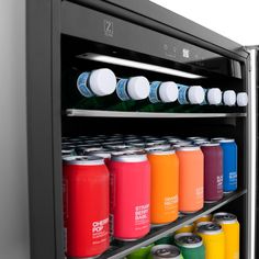 an open refrigerator filled with lots of drinks