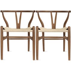 two wooden chairs side by side on a white background