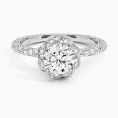 a white gold engagement ring with an intricate flower design on the shan shan shan shan shan shan shan shan shan shan shan shan shan shan shan shan shan shan shan shan shan shan shan shan shan shan shan shan shan shan