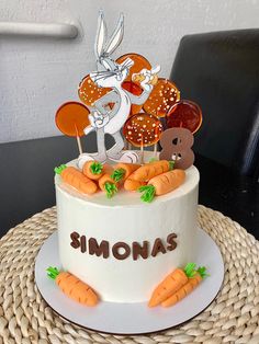 there is a cake that has carrots on it