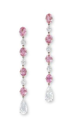 A PAIR OF PADPARADSCHA SAPPHIRE AND DIAMOND EAR PENDANTS. Each set with a line of oval-shaped padparadscha sapphires weighing approximately 1.58 to 1.26 carats, alternating with oval-shaped diamonds, terminating in pear-shaped diamonds, mounted in 18k rose and white gold. Glam Barbie, Ruby Rings, Padparadscha Sapphire, Pink Gem, Ruby Pendant, Precious Jewels, Royal Jewels, Pink Jewelry