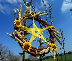 a wreath with sunflowers and a star on it