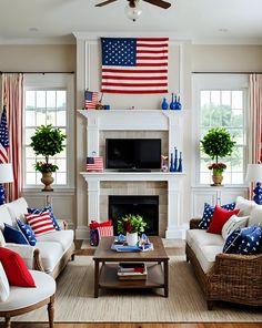 a living room filled with white couches and american flags on the fireplace mantel