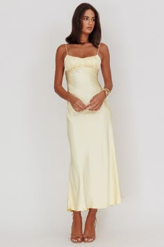 Shop the Nerida Twist Back Satin Maxi Dress Lemon | Selfie Leslie Prom Dresses Size 8-10, Float Maxi Dress, Ruched Maxi Dress With Fitted Bodice For Brunch, Ruched Spaghetti Strap Maxi Dress For Bridesmaids, Fitted Ruched Bodice Maxi Dress For Brunch, Bridesmaid Maxi Dress With Spaghetti Straps And Ruched Details, Bridesmaid Maxi Dress With Spaghetti Straps, Chic Maxi Dress With Sweetheart Neckline And Tie Back, Brunch Maxi Dress With Ruched Bodice And Spaghetti Straps