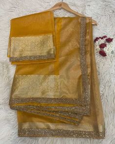 Make a statement on your big day with this stunning Wedding Designer Premium Rich Tissue Silk Saree! The heavy Zari weaving adds a touch of elegance to this bridal saree. Made with high-quality tissue silk, this saree is perfect for any woman who wants to feel beautiful, comfortable, and confident! #WeddingSaree #BridalSaree #PremiumQuality #ZariWeaving #IndianFashion 🌟💛👰 Lehanga Colours, Haldi Rasam, Benaras Sarees, Chiffon Saree Party Wear, Saree Heavy, Saree Party, Kalamkari Dresses, Latest Silk Sarees, Marriage Ideas