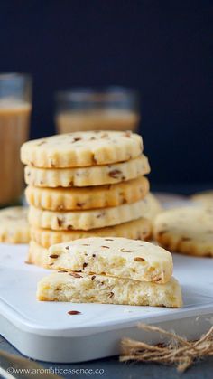 a stack of cookies sitting on top of a white plate