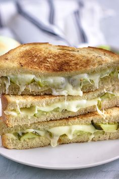 a grilled cheese and avocado sandwich on a plate