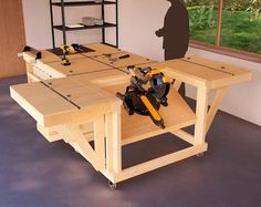 a workbench with tools on it in front of a window and a silhouette of a man