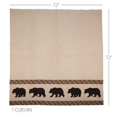 three bears are shown on the side of a beige towel with brown and black trim