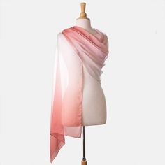 There's nothing like an Italian silk wrap to add a touch of chic elegance to your look.This gossamer-light silk chiffon wrap will add classic femininity to your look, effortlessly complementing any ensemble with grace and charm.A flowing sheer color ombré from peach blossom pink to white. Details Generous size: Approx. 27” x 78” (70 x 200cm). This wrap can be worn as an elegant evening shawl and as a daytime scarf. A timeless addition to your wardrobe. 100% silk chiffon: A luxurious, gossamer-li Silk Shawl For Spring Formal Events, Silk Shawl For Spring Formal Occasions, Silk Shawl For Formal Spring Events, Spring Formal Silk Shawl, Feminine Silk Scarves For Formal Occasions, Formal Feminine Silk Scarves, Elegant Silk Shawl Scarf For Summer, Spring Wedding Silk Shawl, Elegant Sheer Silk Scarves