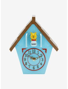 a small blue clock with winnie the pooh on it's face and numbers