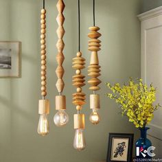 several light bulbs hanging from the ceiling in a room