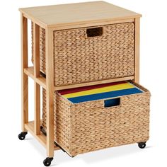 a wicker storage unit with two baskets on wheels and one drawer open to show files