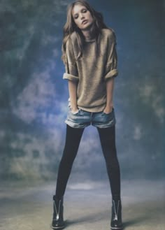 The tights work for your slim legs as well. Here we have a Tan over-sized sweater, rolled jean shorts, black tights and black booties. Mode Poses, Winter Tights, Winter Shorts, Autumn Look, Shorts With Tights, Black Tights, Short Shorts, Fall Looks