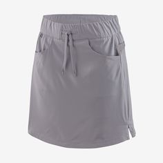 Superlight and quick-drying, the Tech Skort features four-way stretch material for athletic motion. The outer skirt moves effortlessly, and the stay-put inner shorts provide all-day comfort for everything from wet wading to hiking. Two front pockets and a zip security pocket keep essentials handy. Made in a Fair Trade Certified™ factory. | Patagonia Women's Tech Skort in Herring Grey, XS - Recycled Polyester/Spandex/Pfas Rain Pants, Casual Running Shoes, Tent Accessories, Climbing Shoes, Kids Outerwear, Socks And Sandals, Patagonia Womens, Rain Wear, Mens Outerwear