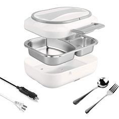 an electric lunch box with utensils and tongs