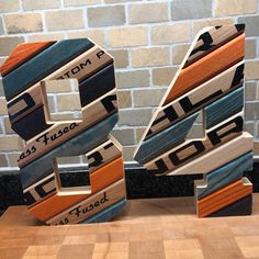 the letters are made out of wood and have different colors