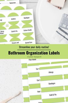 bathroom organization labels with text overlaying them on a white table and green background