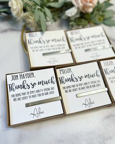 four wedding thank you notes with flowers in the background