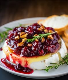 cranberry sauce is on top of cheese and bread