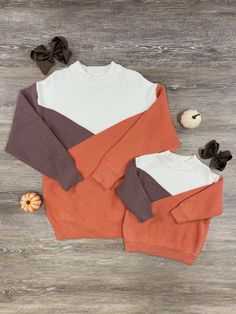 Celebrate the enchanting hues of autumn with our Mom and Me Colors of Fall Pullover Sweater. Wrap yourselves in the warm embrace of seasonal style. Ships fast. Fall Pullover Sweaters, Toddler Girl Fall, Fall Pullover, Sweater Wrap, Mom And Me, Pumpkin Patches, Colors Of Fall, Mommy And Me Dresses, Mom Sweater