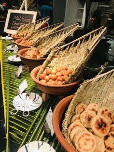 several baskets filled with food sitting on top of a table