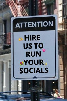 a sign that says hire us to run your socials on the side of a street