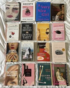 there are many books on the bed together in this picture, but no one is reading them