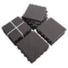 four pieces of black and white tile sitting on top of each other in the shape of squares